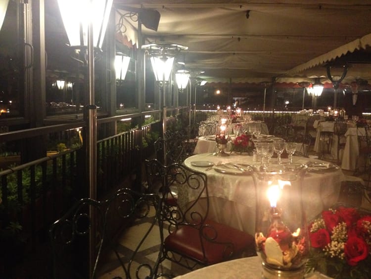 13_things_to_do_and_see_on_your_first_trip_to_Rome_full_time_explorer_hotel_palatine_best_food_roof_restaurant_night_tables