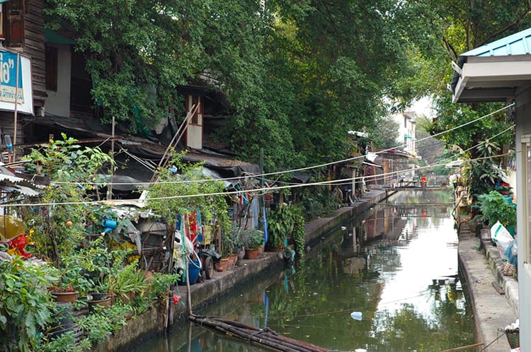 A small canal running through Bangkok, Thailand