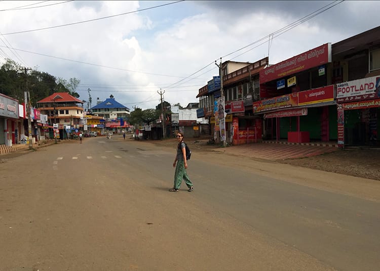 Michelle Della Giovanna from Full Time Explorer crosses an empty street during a road strike in India