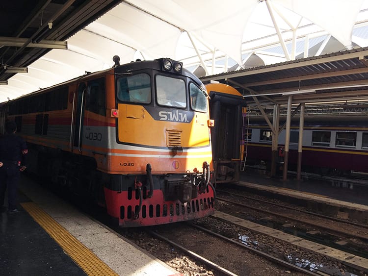 A Thai Railways North Line train pulls into the station