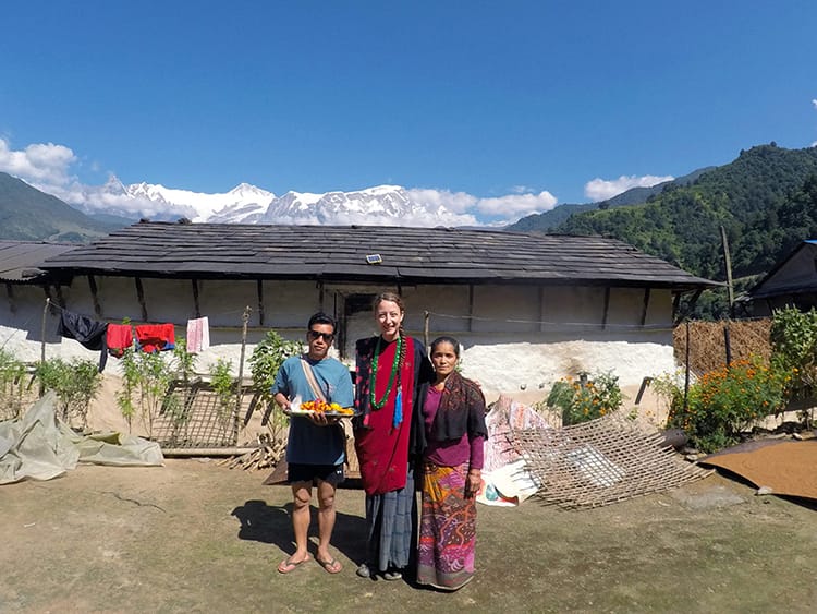 Michelle Della Giovanna from Full Time Explorer dressed in traditional Gurung clothing in Tangting Village, Nepal