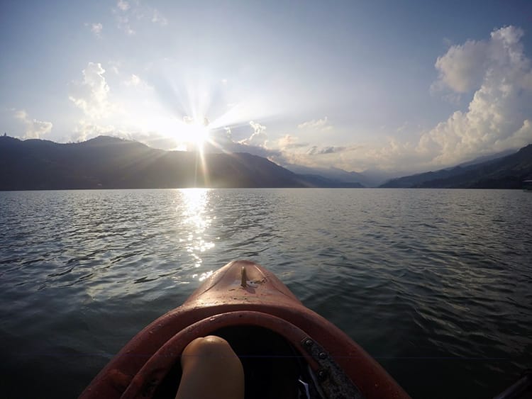 A Kayak sits on Phewa lake in Pokhara, Nepal - Places To Visit in Pokhara