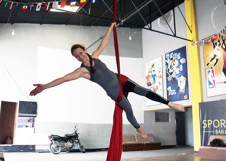 Michelle Della Giovanna from Full Time Explorer learns aerial silks in Patan, Nepal