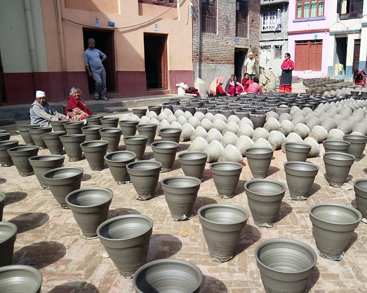 Flower pots sit in the sun drying in Thimi, Nepal