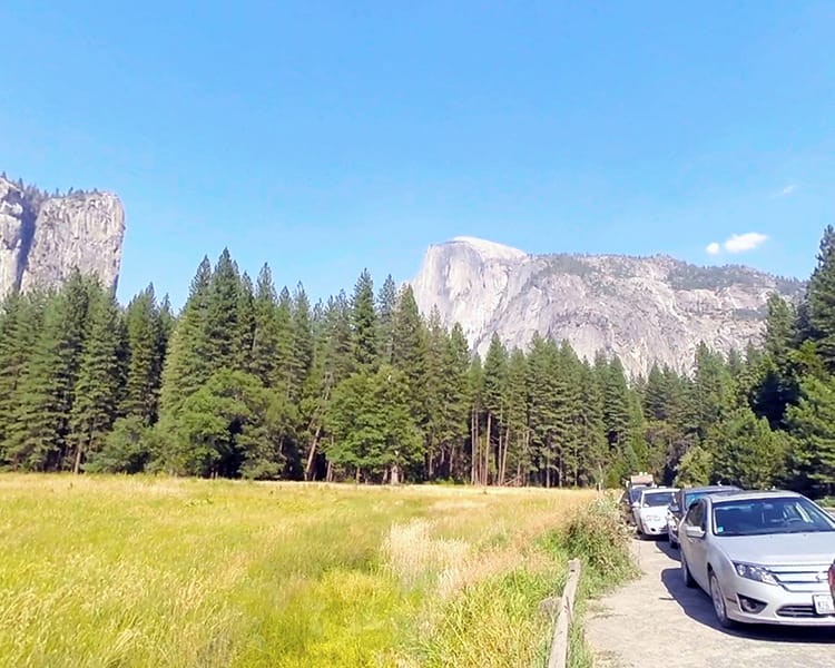 Cars stuck in traffic while driving through Yosemite on a narrow road