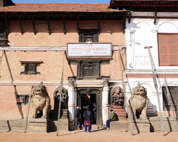 People enter the National Arts Museum in Bhaktapur Nepal