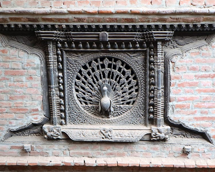 The famous wood carved peacock window in Bhaktapur