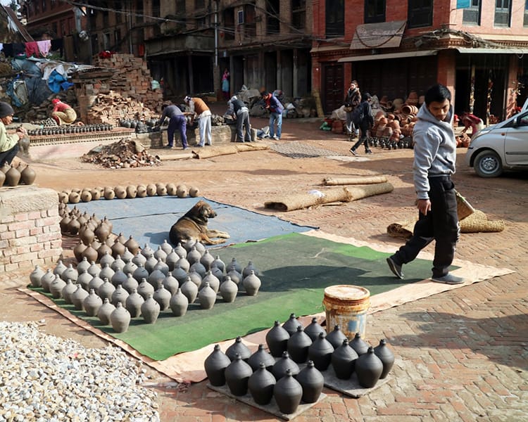 Pottery sits in the streets of Pottery Square waiting to dry in Bhaktapur