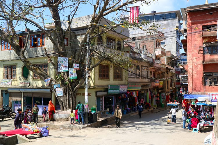 A chautari tree in the middle of a busy street in Tansen, Nepal