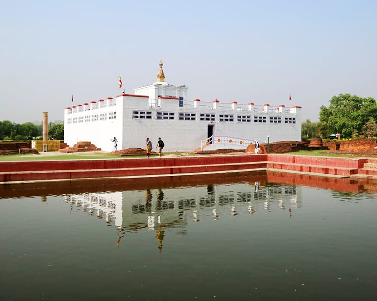 Maya Devi Temple reflected in a pond in Lumbini, Nepal