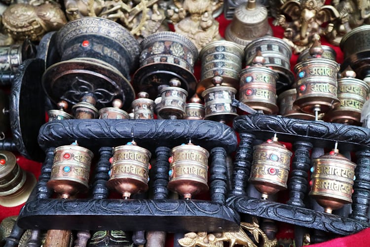 Small prayer wheels being sold at a souvenir shop in Nepal