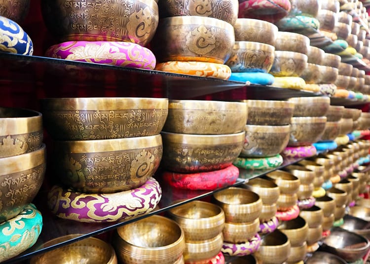 Singing bowls line the walls of a souvenir shop in Kathmandu