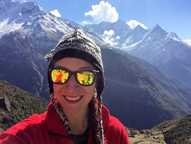 Michelle Della Giovanna of Full Time Explorer wears a yak wool hat in the Himalayas
