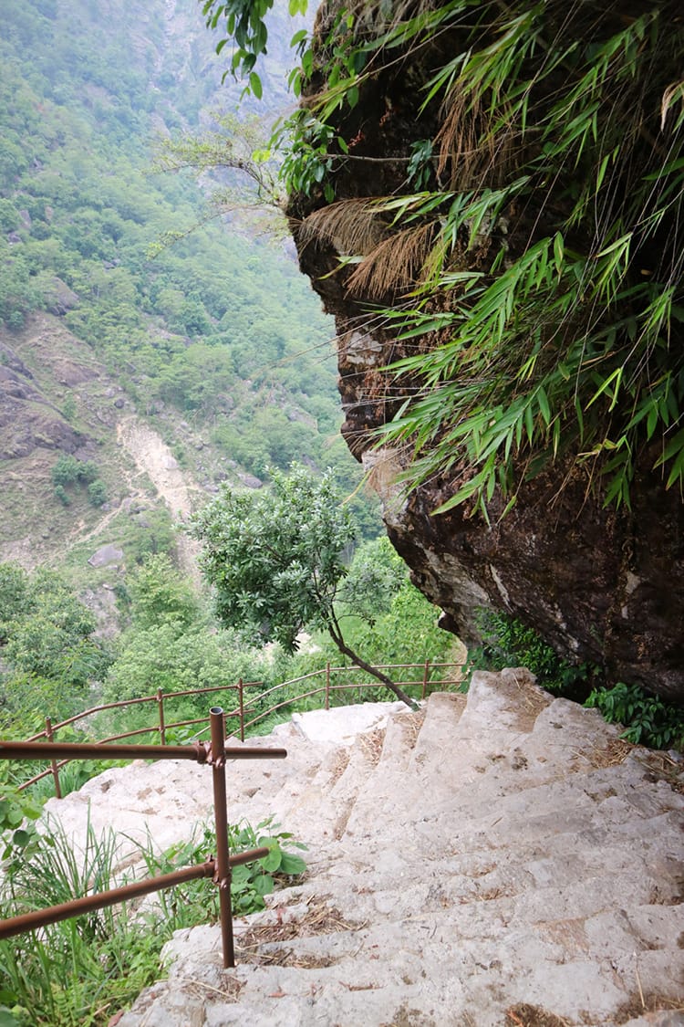 A very steep staircase goes along the cliffs on the way to Tsho Rolpa