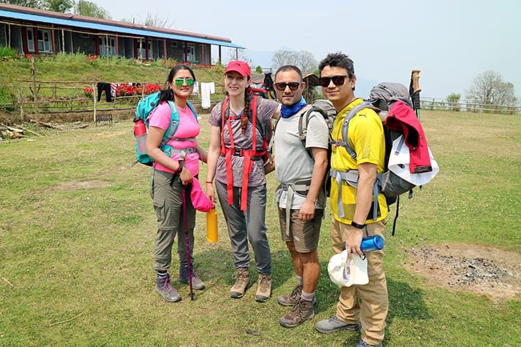 Michelle Della Giovanna from Full Time Explorer and family take a photo on the way to Mardi Himal Base Camp