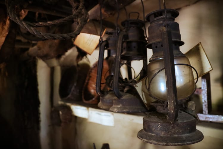 Old lamps hanging inside the Old Gurung Museum in Nepal