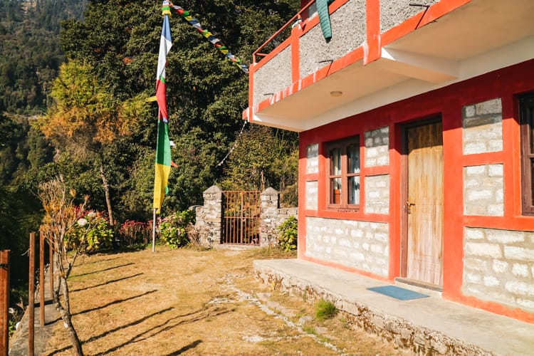 A Lodge with a garden and prayer flags in Melamchi Ghyang