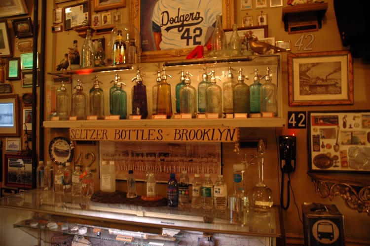A collection of old seltzer bottles from Brooklyn in the City Reliquary