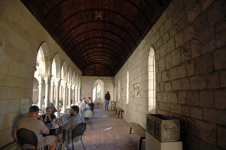 People sit and dine at a cafe in The MET Museum Cloisters