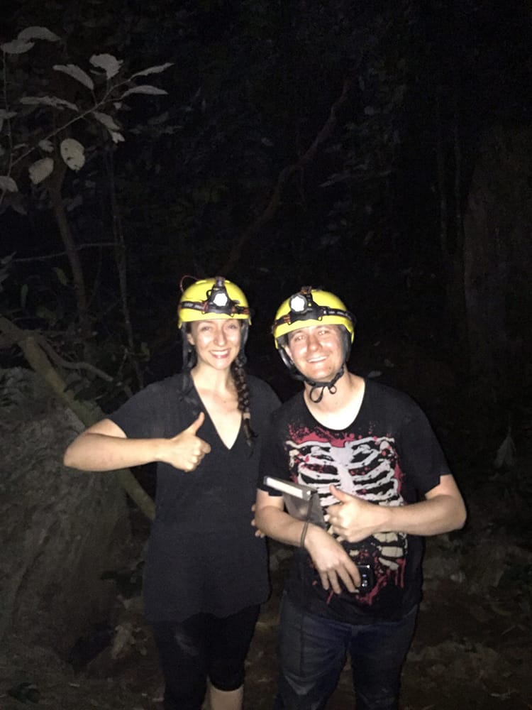 Michelle Della Giovanna from Full Time Explorer and her friend Neal after getting out of the cave and feeling relieved 