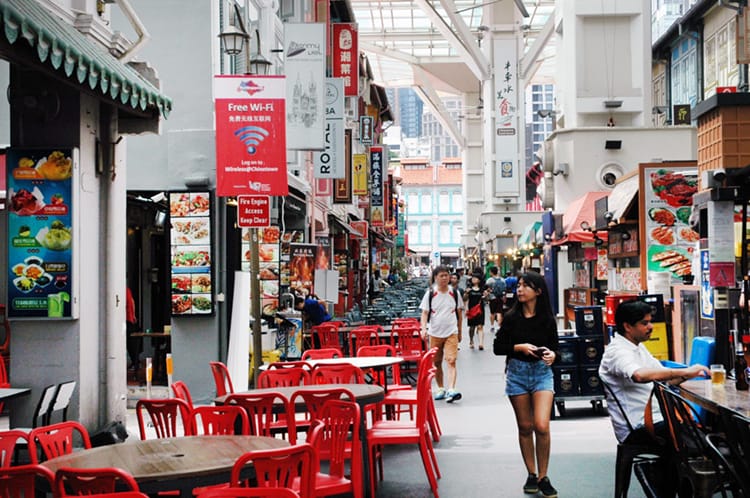 Hawker stalls line a pedestrian street in Singapore