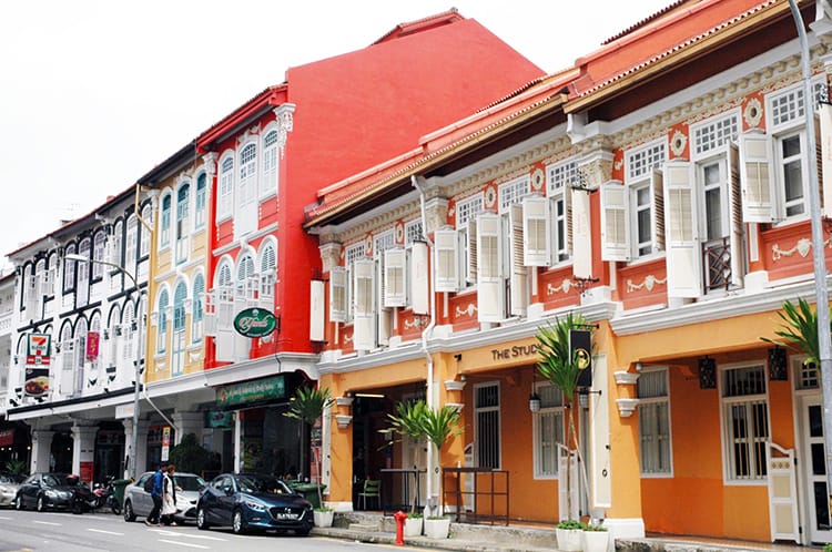 Brightly painted buildings line the streets of Chinatown in Singapore