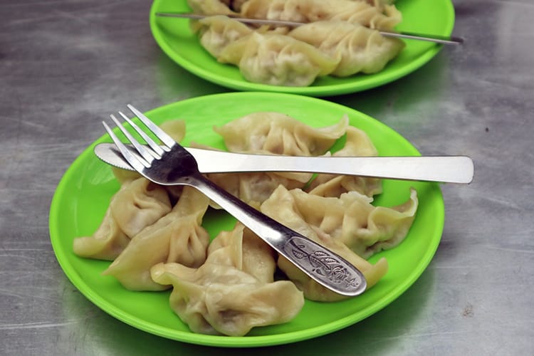 The best momos in Nepal served at the Tibetan Refugee Camp - Places to visit in Pokhara