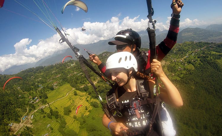 Michelle Della Giovanna from Full Time Explorer goes paragliding in Pokhara, Nepal  - Places to visit in Pokhara