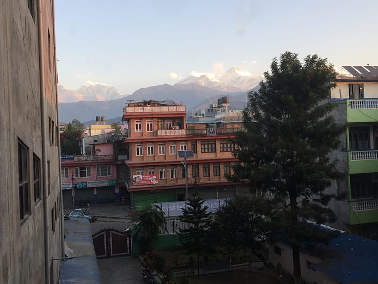 A view from the window of Fishtail hospital in Pokhara with epic Himalayan views