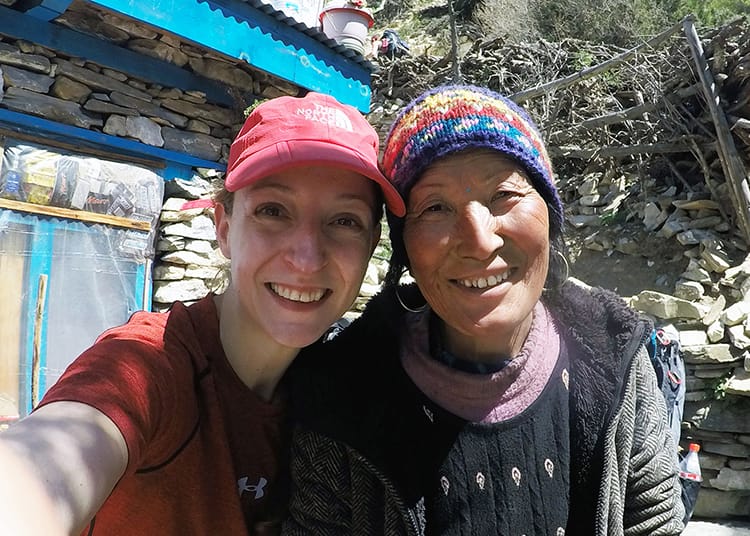 Michelle Della Giovanna from Full Time Explorer takes a selfie with a local teahouse owner