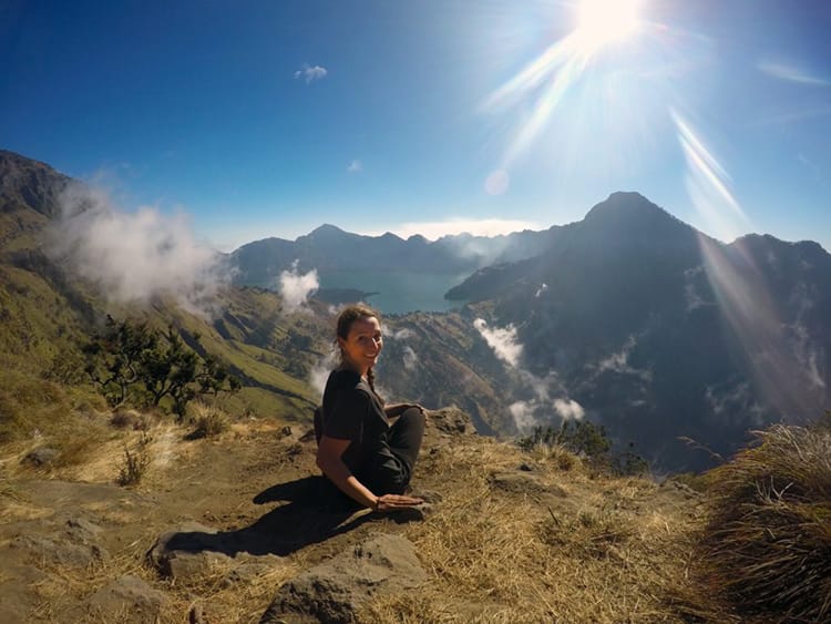 Michelle Della Giovanna from Full Time Explorer overlooks a lake in Indonesia
