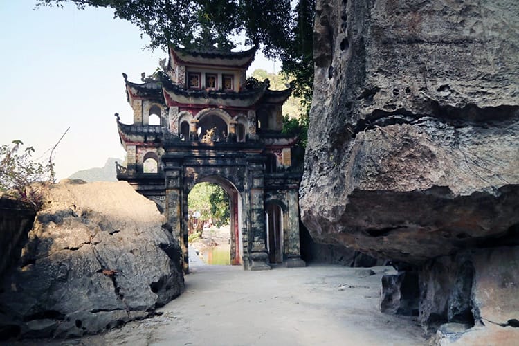 The elaborate entrance to Bich Dong Pagoda which is set between giant boulders