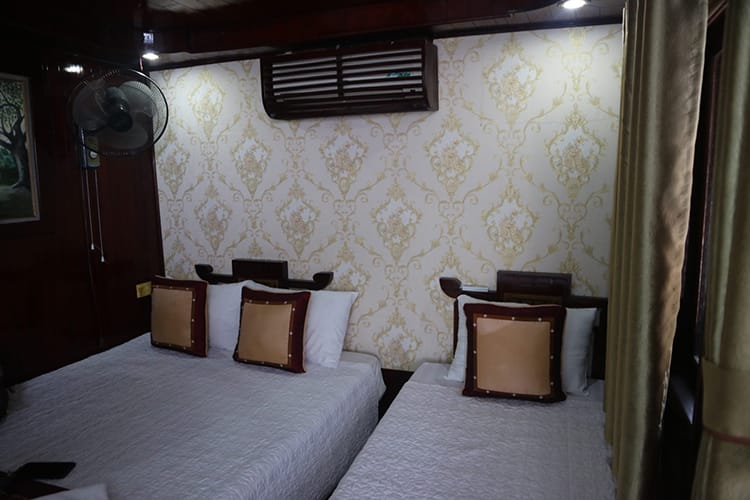 A triple room inside a Halong Bay Cruise boat