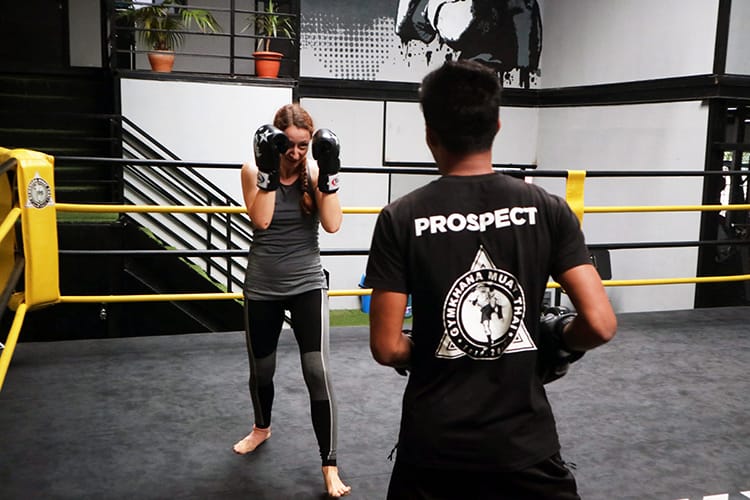 Michelle Della Giovanna from Full Time Explorer learns the muay thai stance and footing