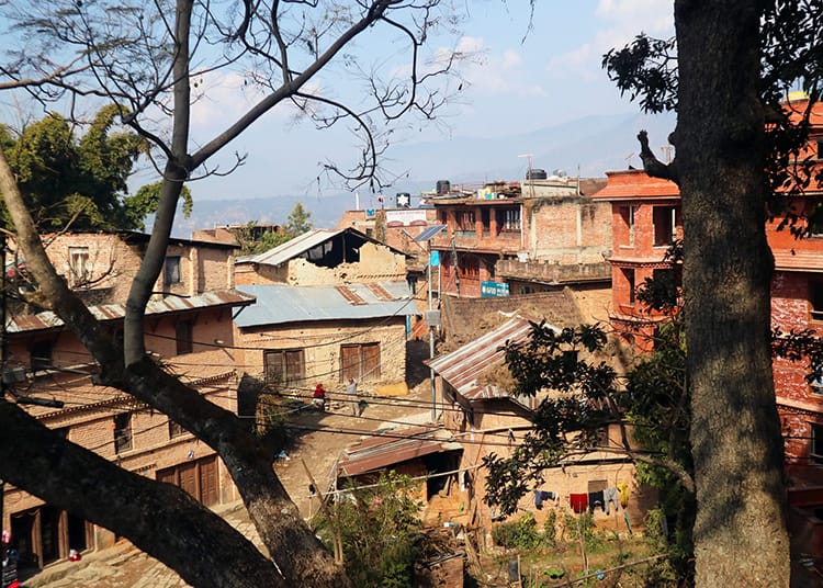 View of the brick city of Changu Narayan from the staircase leading up to the temple