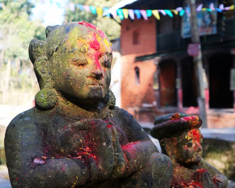 A cement statue with sindoor powder on it's forehead in the Gaukhureshowr Mahadev Temple