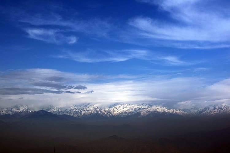A brilliant view of the Himalaya mountains when the sky starts to clear in the evening