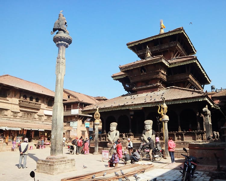 The Dattatreya Temple in Dattatreya Square in Bhaktapur on a busy day
