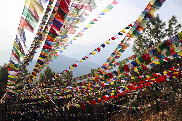 Thousands of prayer flags fly in the sky during Losar at Namo Buddha Monastery in Nepal