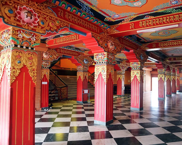 The bright red walls of Namo Buddha Monastery
