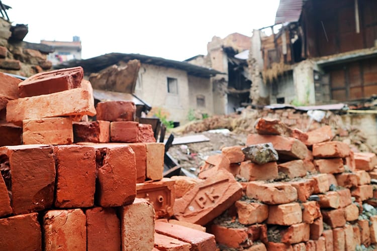 Bricks stacked in Bungamati wating to be rebuilt
