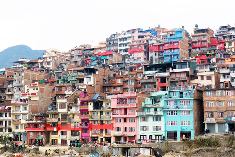 Colorful buildings stacked on the hills of Kirtipur