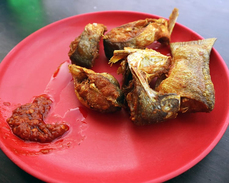Fried fish that were caught in Kulekhani Reservoir served with homemade chili sauce