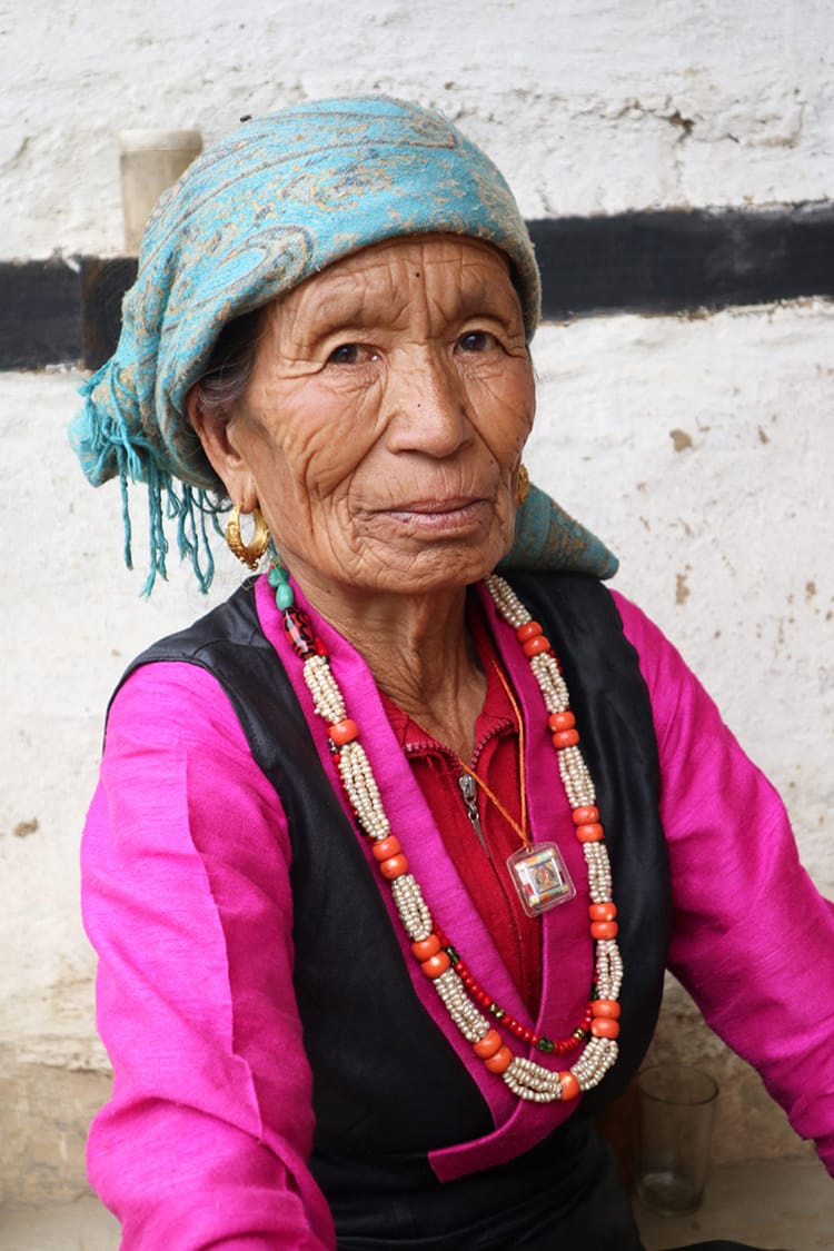 A women poses for a portrait in Simigaun, Nepal