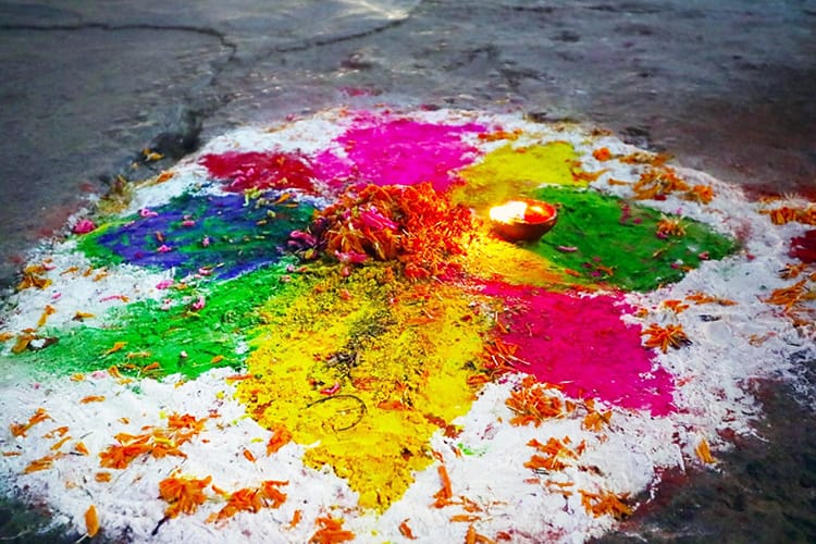 A Tihar decoration in Nepal in November which is a mandala made out of colorful powders