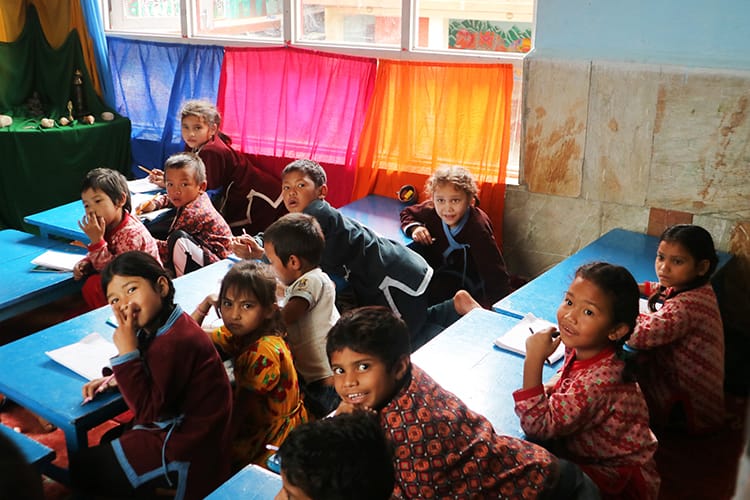 Children study in a classroom at Shanti Leprahilfe