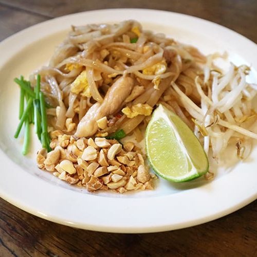 Pad Thai with peanut garnish on the side