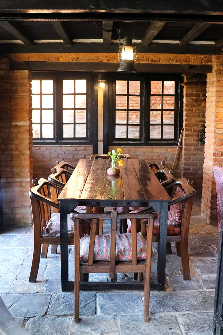 A table in the dining room of a heritage hotel (Old Inn) in Bandipur, Nepal