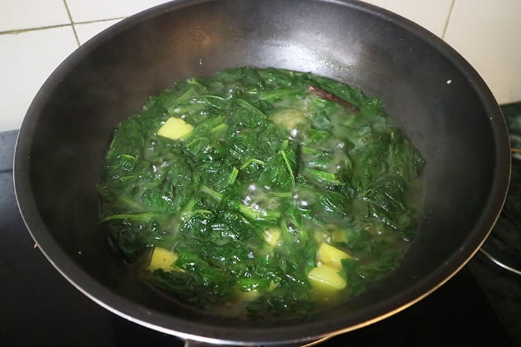 Once the spinach and water are added.