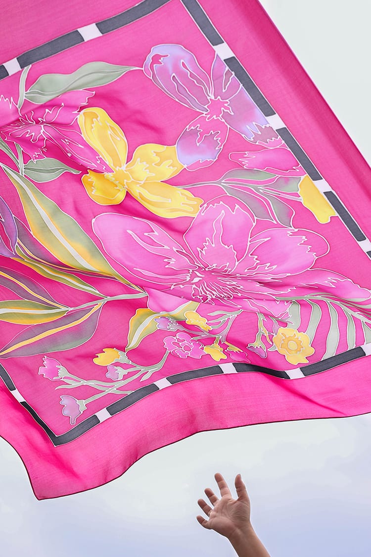 A beautiful pink hand painted scarf from Kallisto Designs